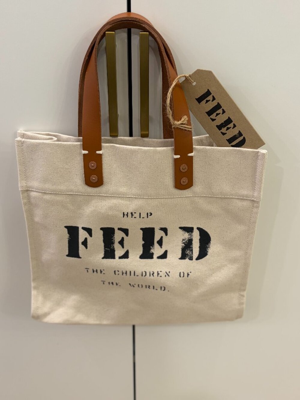 HELP FEED THE CHILDREN OF THE WORLD WHITE CANVAS TAN LEATHER TOTE BAG NWT